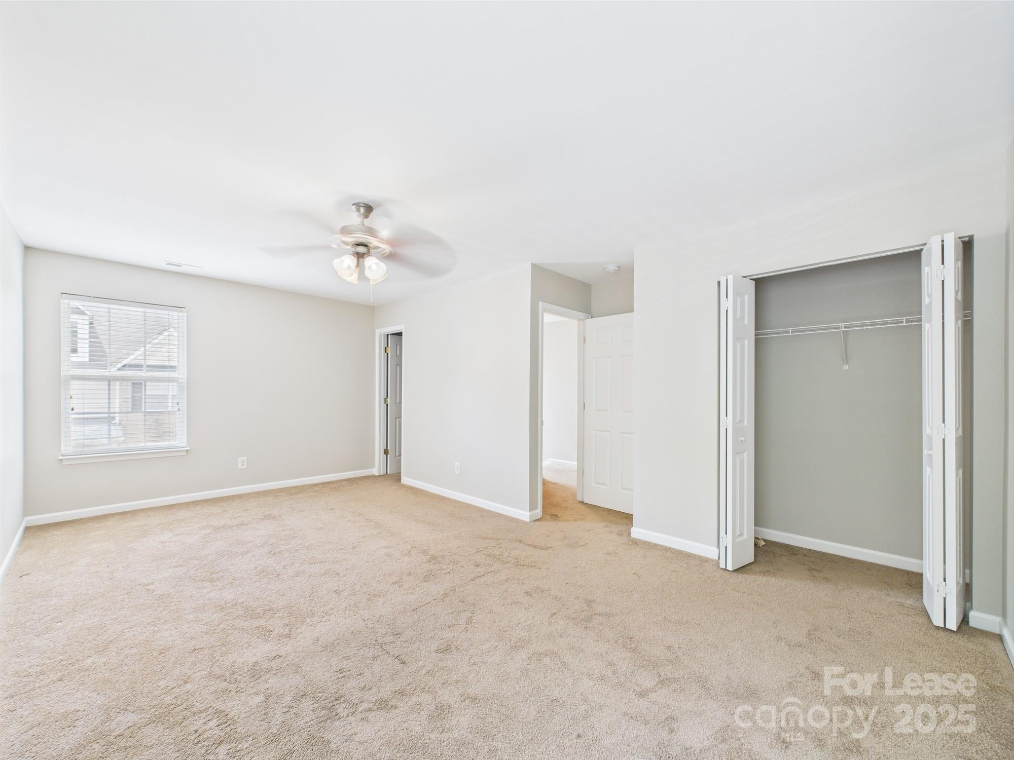 5706 Bent Creek Circle Charlotte, NC 28227 - Photo 12 of 13 a view of an empty room with a window