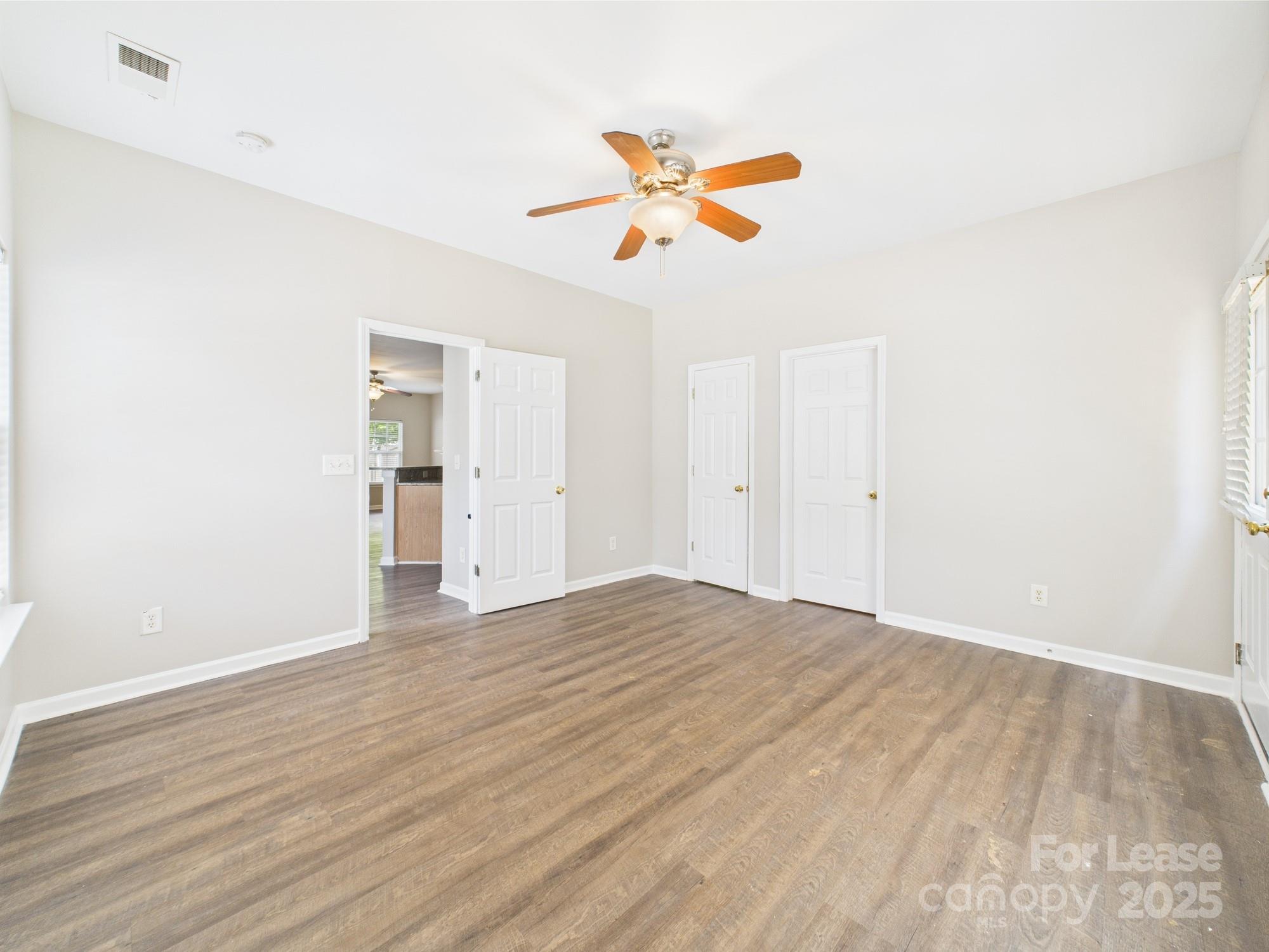 5706 Bent Creek Circle Charlotte, NC 28227 - Photo 9 of 13 a view of empty room with wooden floor