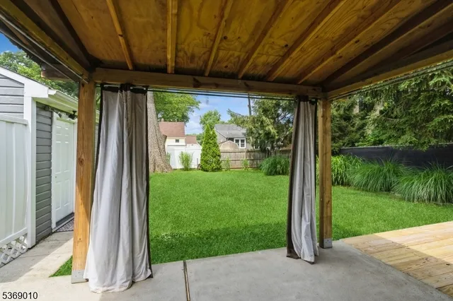 a view of a garden with a fountain