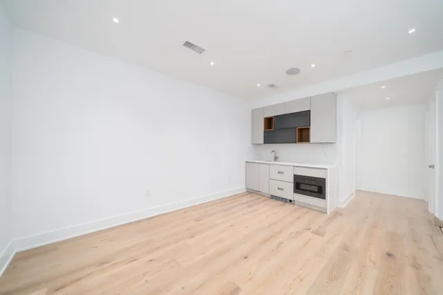 a view of a livingroom with a flat screen tv