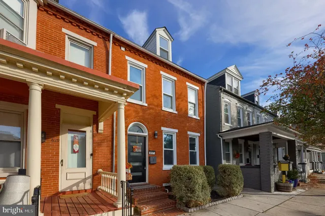 a front view of a building with street view