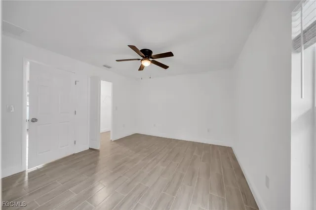 an aerial view of residential houses with outdoor space and river