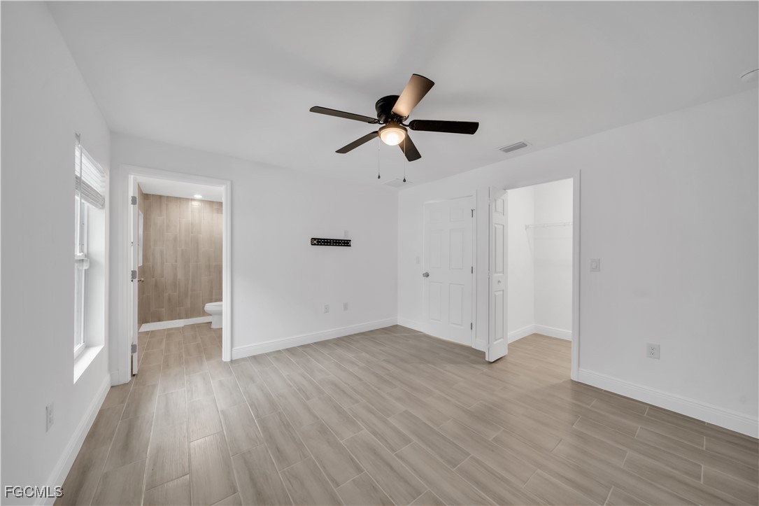 2156-2154 Edison Avenue Fort Myers, FL 33901 - Photo 25 of 38 a view of empty room with wooden floor