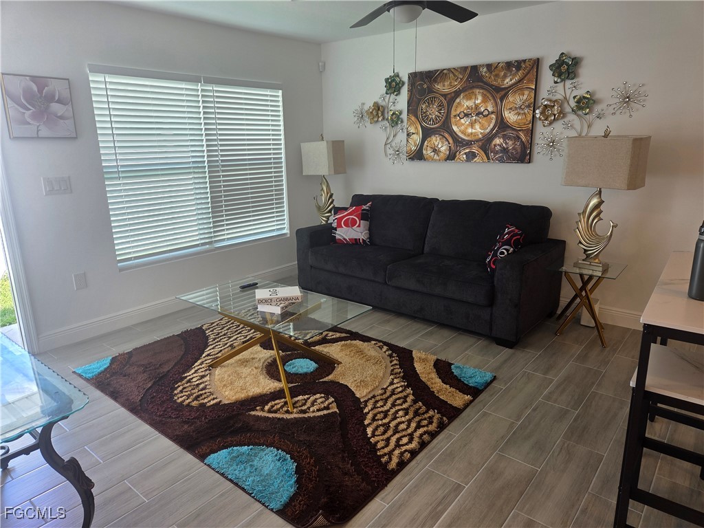 2156-2154 Edison Avenue Fort Myers, FL 33901 - Photo 8 of 38 a living room with furniture and a window