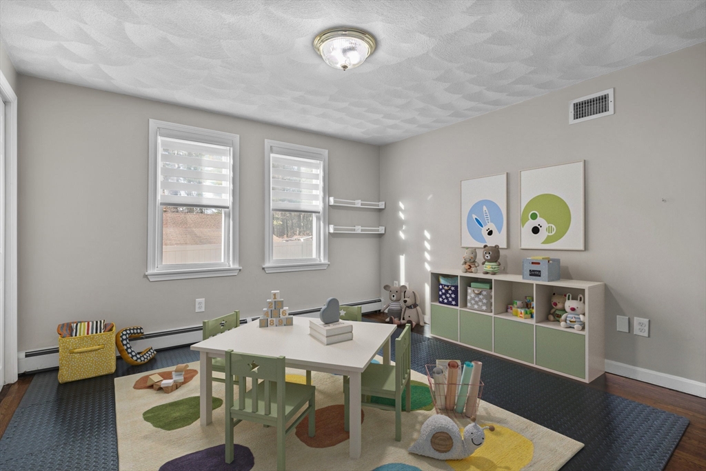 201 Water Street Saugus, MA 01906 - Photo 18 of 38 a living room with furniture and wooden floor