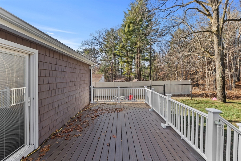 201 Water Street Saugus, MA 01906 - Photo 29 of 38 a view of balcony with wooden floor and fence