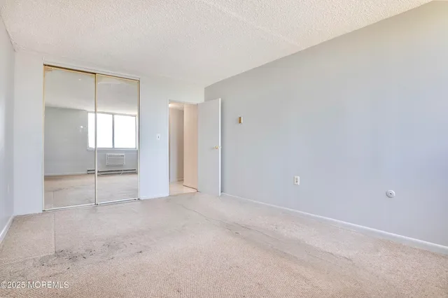 a view of an empty room with window