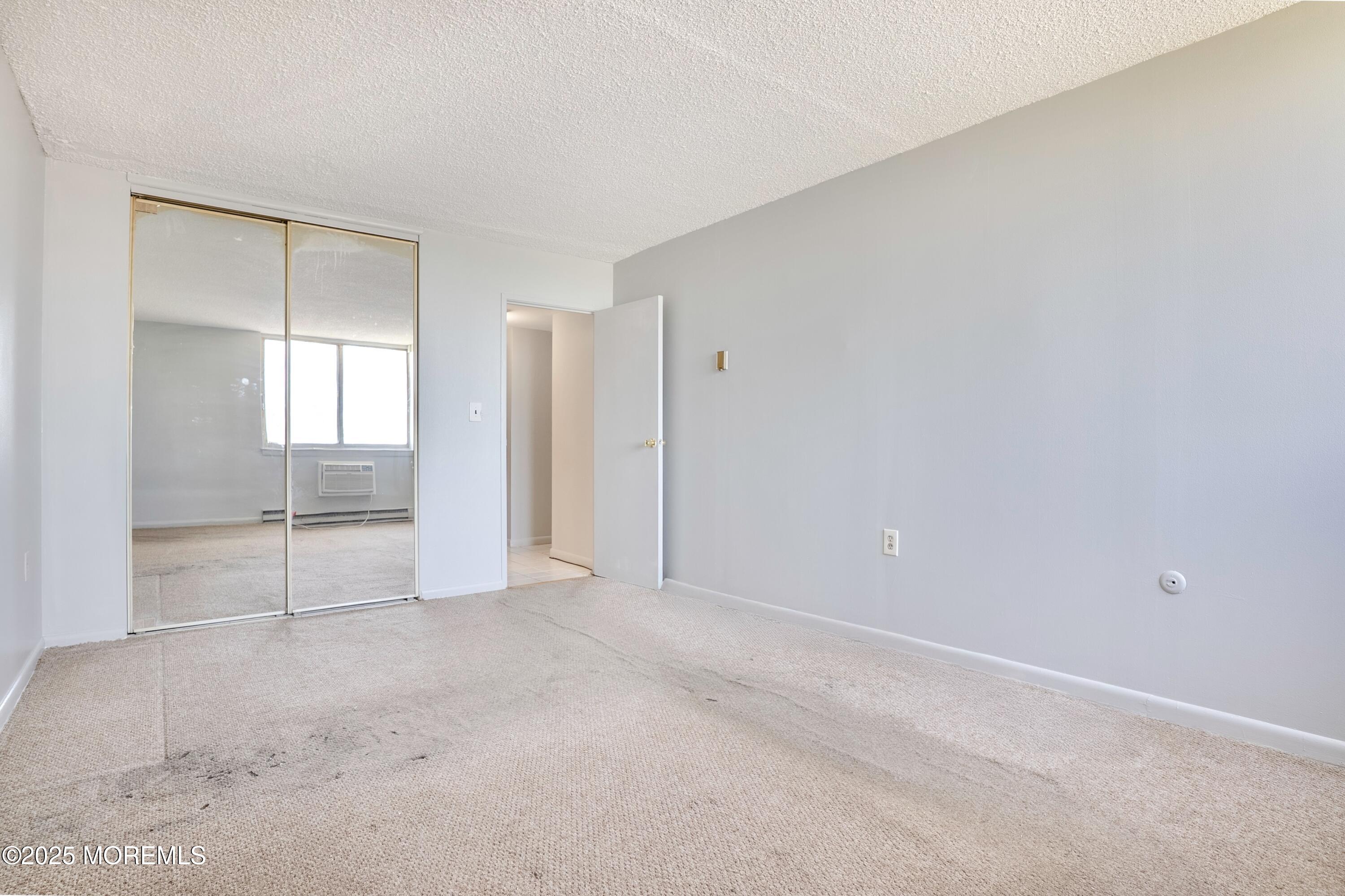 1000 River Road, Unit 4G Belmar, NJ 07719 - Photo 11 of 13 a view of an empty room with window
