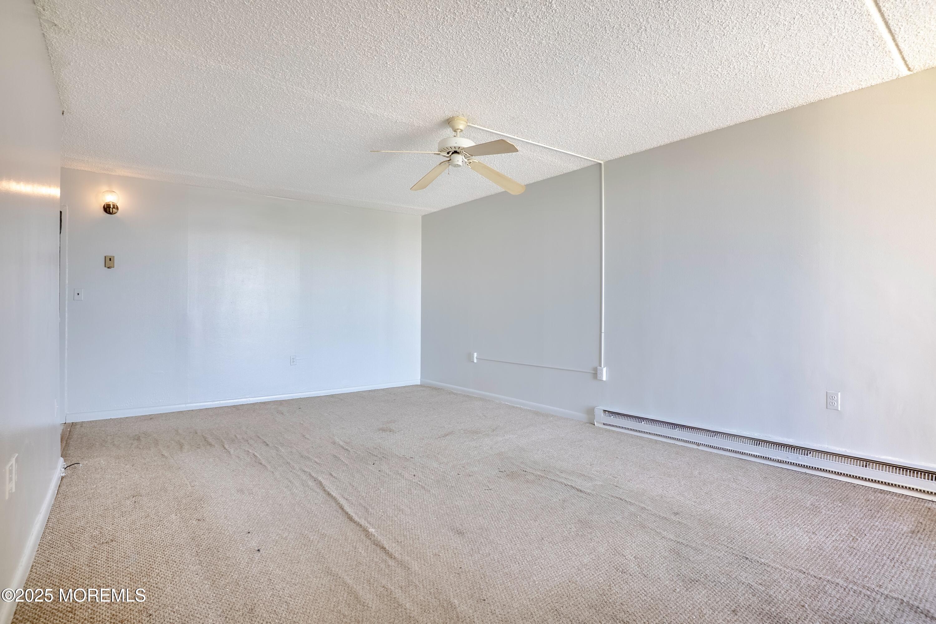 1000 River Road, Unit 4G Belmar, NJ 07719 - Photo 13 of 13 wooden floor in an empty room