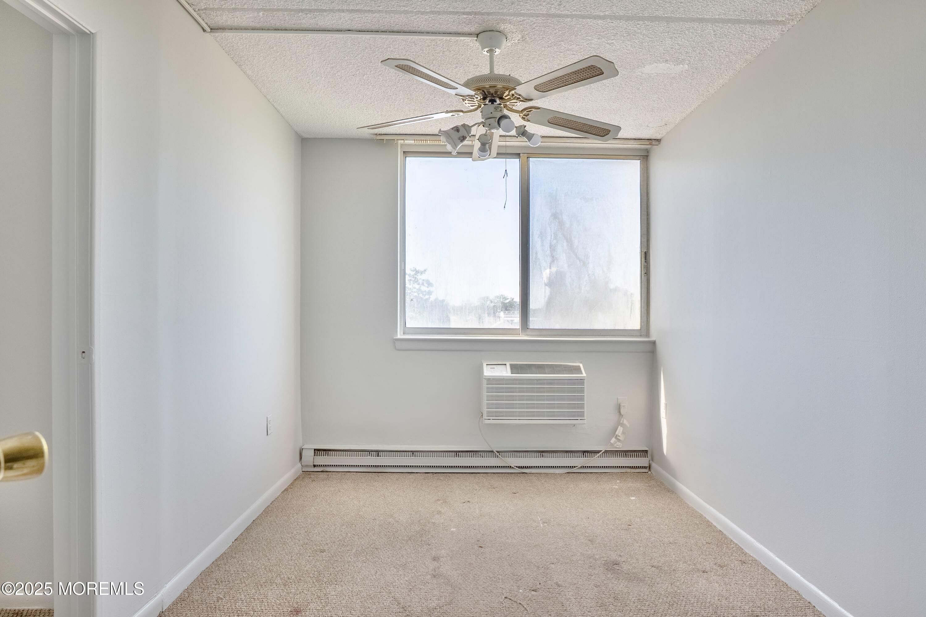 1000 River Road, Unit 4G Belmar, NJ 07719 - Photo 8 of 13 a view of an empty room with a window