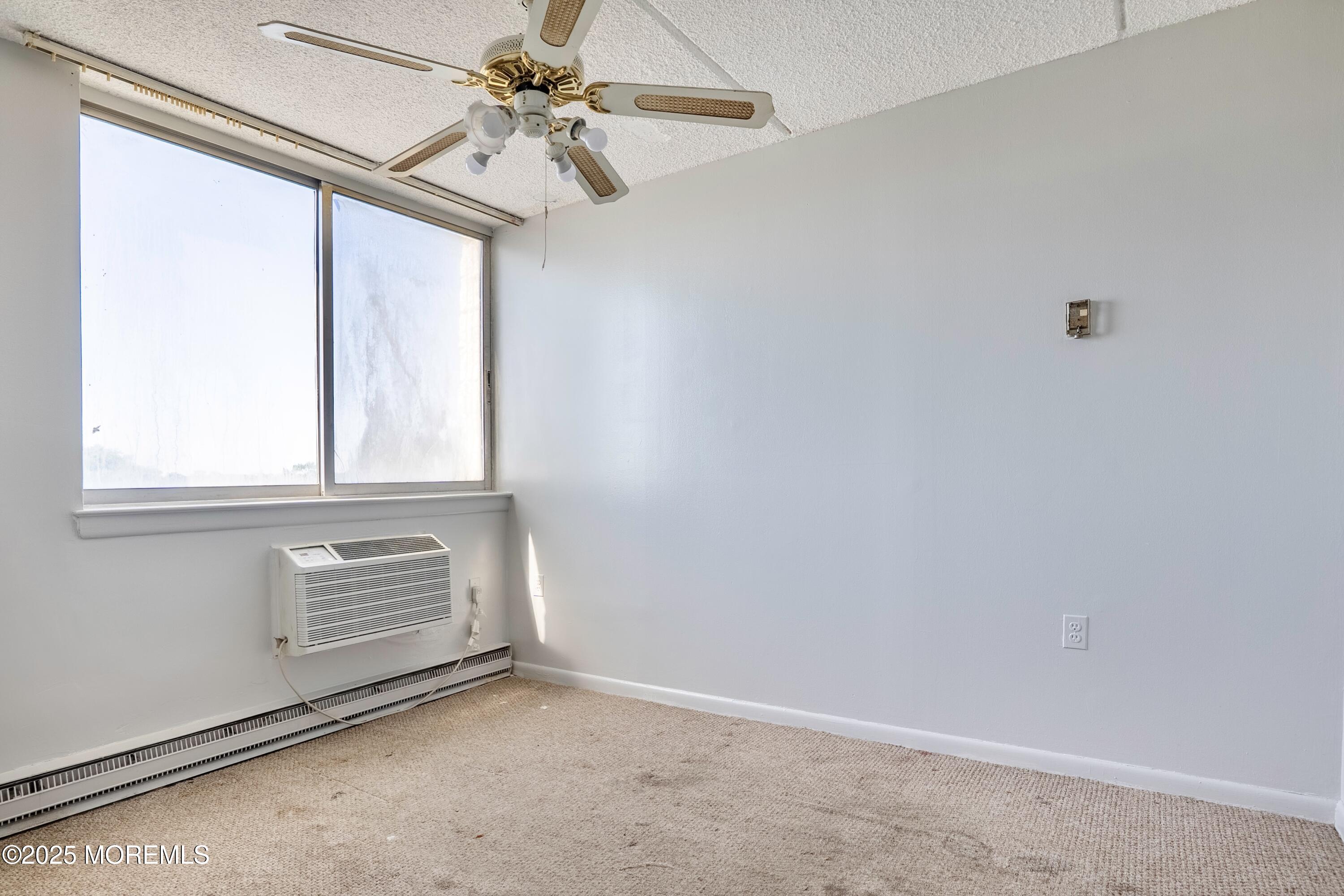 1000 River Road, Unit 4G Belmar, NJ 07719 - Photo 9 of 13 a view of an empty room with a window