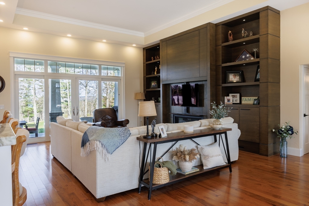 1776 Old Turnpike Road Oakham, MA 01068 - Photo 12 of 42 a living room with furniture and wooden floor