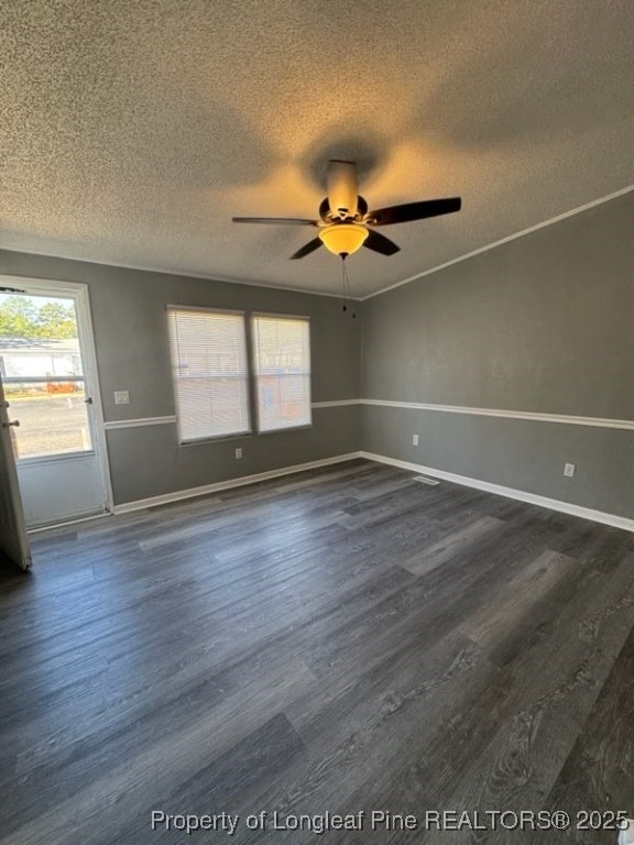 114 Oak Street Fayetteville, NC 28306 - Photo 1 of 6 an empty room with wooden floor and windows