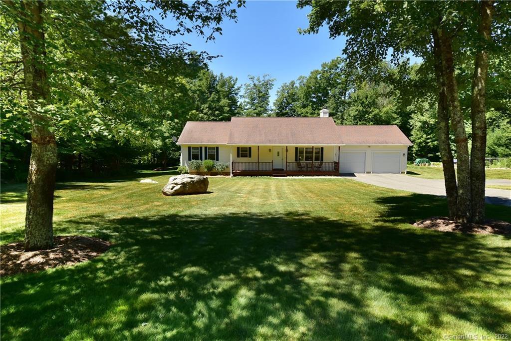 63 Hopyard Road Stafford, CT 06076 - Photo 1 of 1 a view of a house with a yard