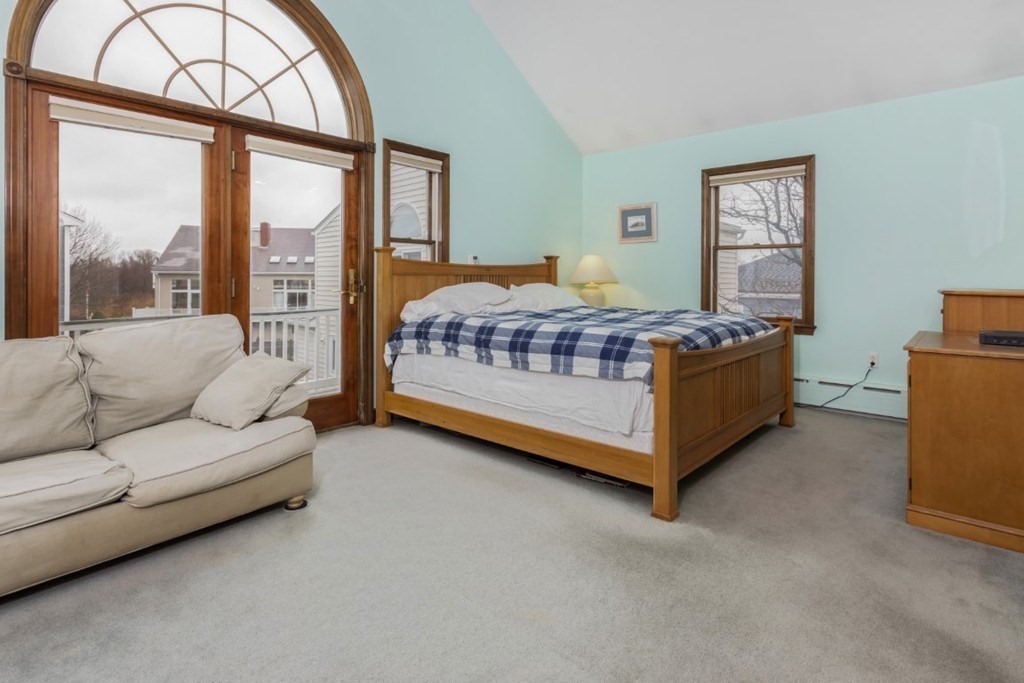 8 Castle Road Nahant, MA 01908 - Photo 21 of 32 a bedroom with a bed couch and window