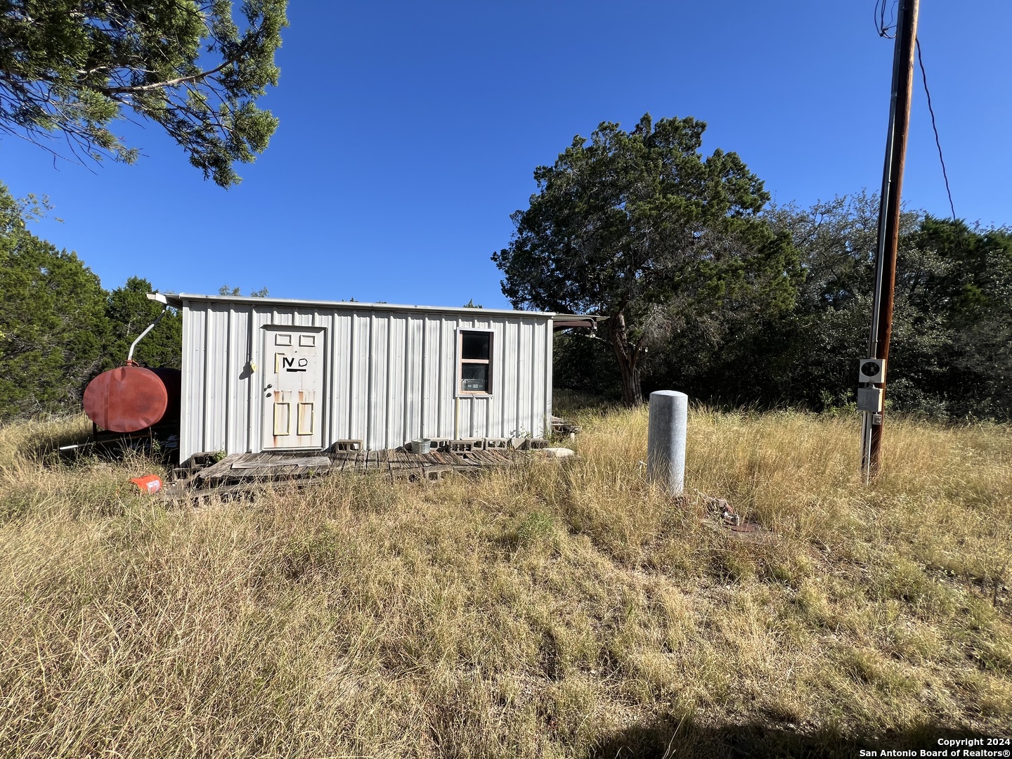 Tbd Tbd Brackettville, TX 78832 - Photo 11 of 13 a backyard of a house with lots of green space