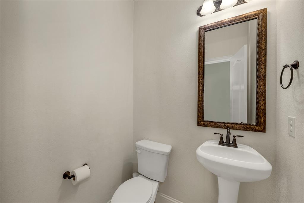 2203 Vista Ridge Road Melissa, TX 75454 - Photo 19 of 40 Half bathroom with toilet