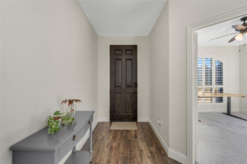 2203 Vista Ridge Road Melissa, TX 75454 - Photo 4 of 40 Foyer featuring dark wood finished floors and a ceiling fan