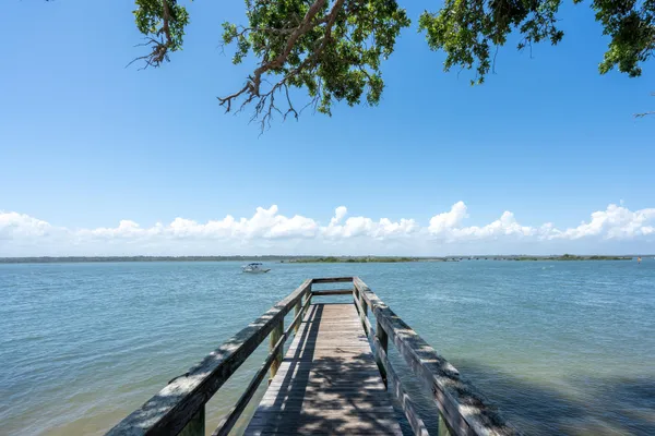 a view of a lake from a yard