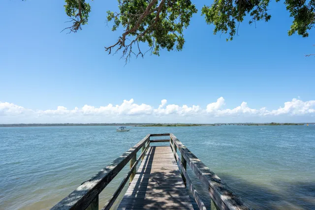 a view of a lake from a yard