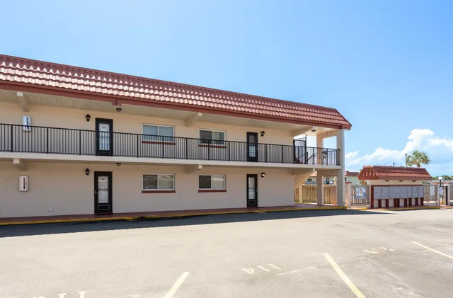 a room with a window and storage space