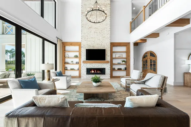 a kitchen with stainless steel appliances granite countertop a refrigerator and a stove