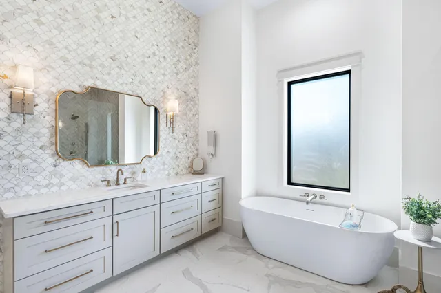 a view of a house with sitting area and garden