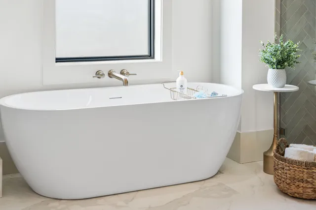 a view of a kitchen with a sink and a potted plant