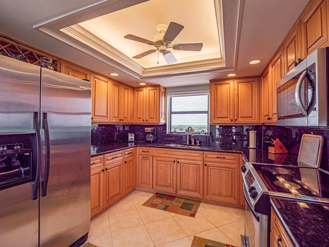 a bedroom with two beds and painted walls
