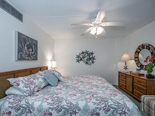 a view of swimming pool with furniture