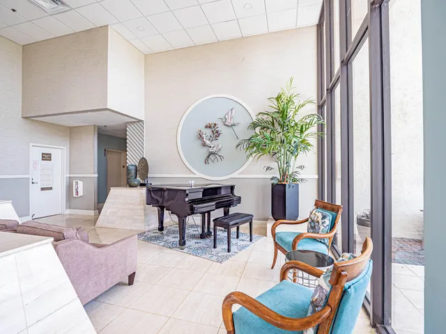 a outdoor space with lots of furniture and a view of dining room