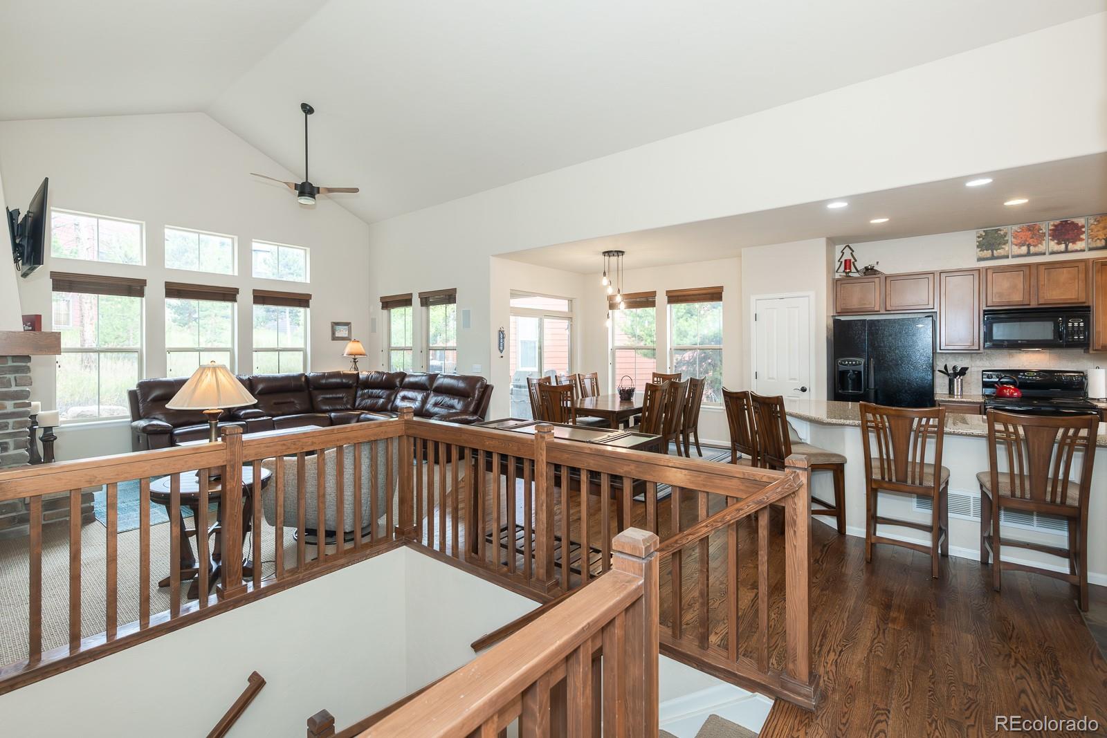 103 Timber Court Granby, CO 80446 - Photo 15 of 50 a view of a dining room with furniture window and wooden floor