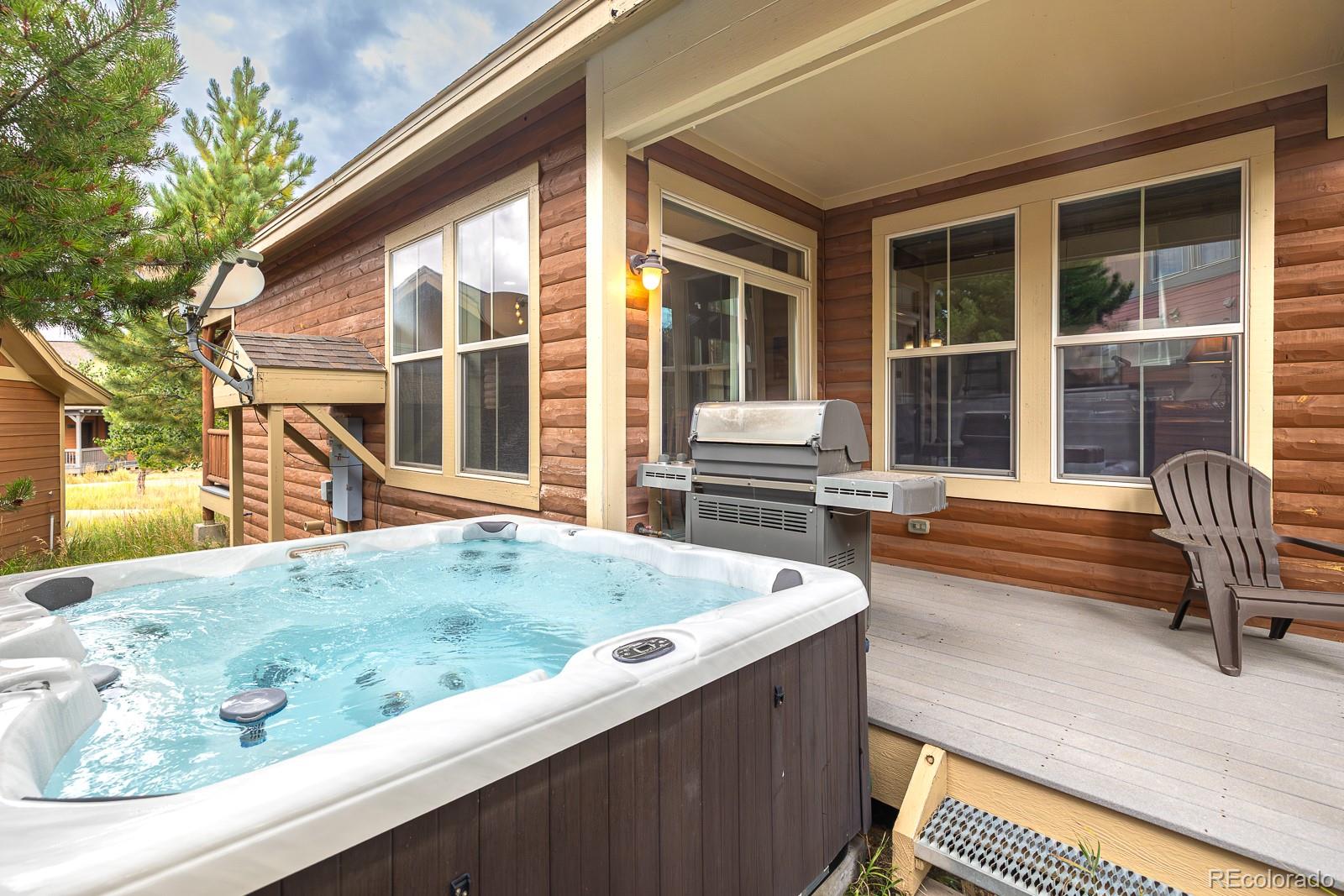 103 Timber Court Granby, CO 80446 - Photo 2 of 50 a view of a house with backyard and sitting area