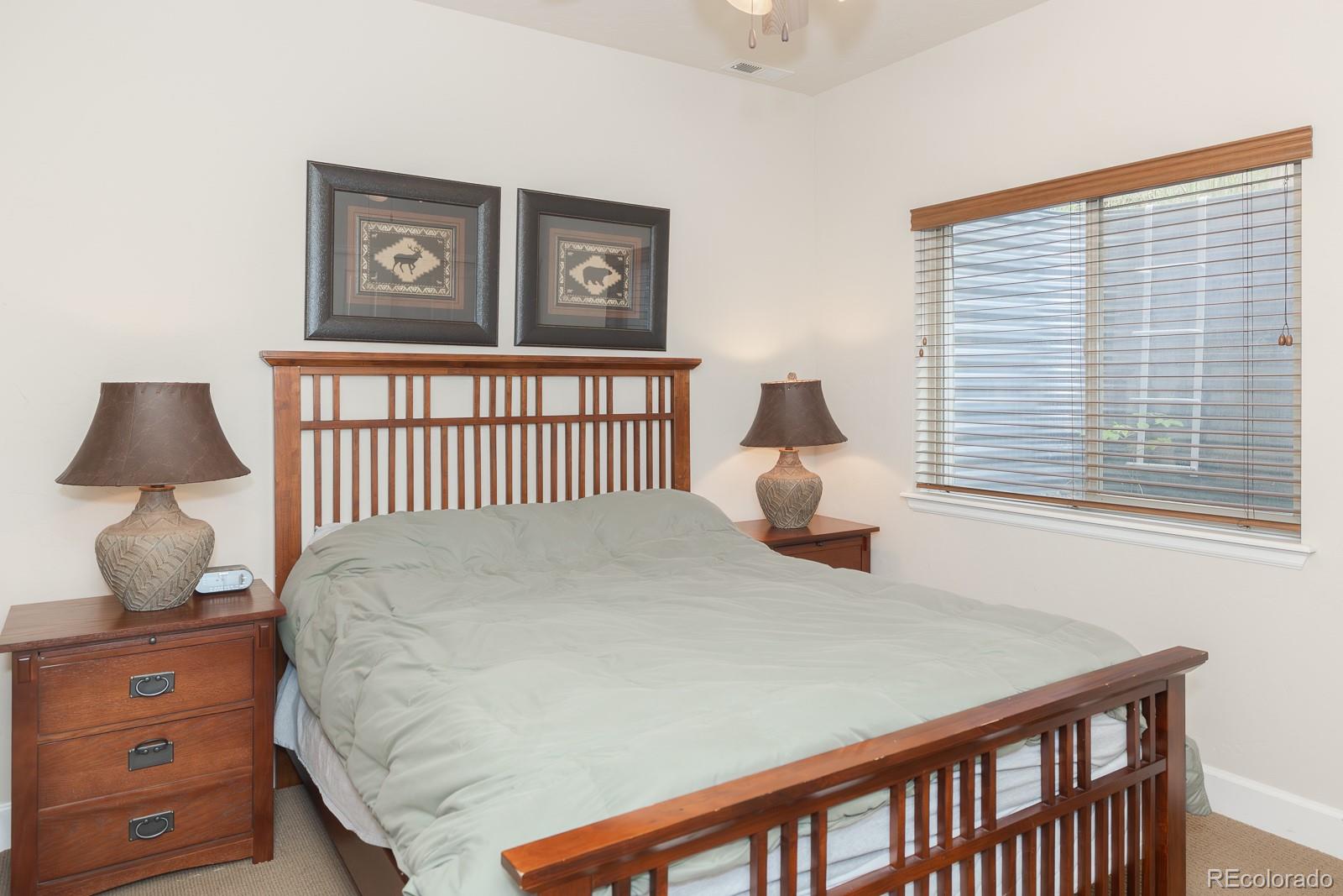 103 Timber Court Granby, CO 80446 - Photo 29 of 50 a bedroom with a bed and a window