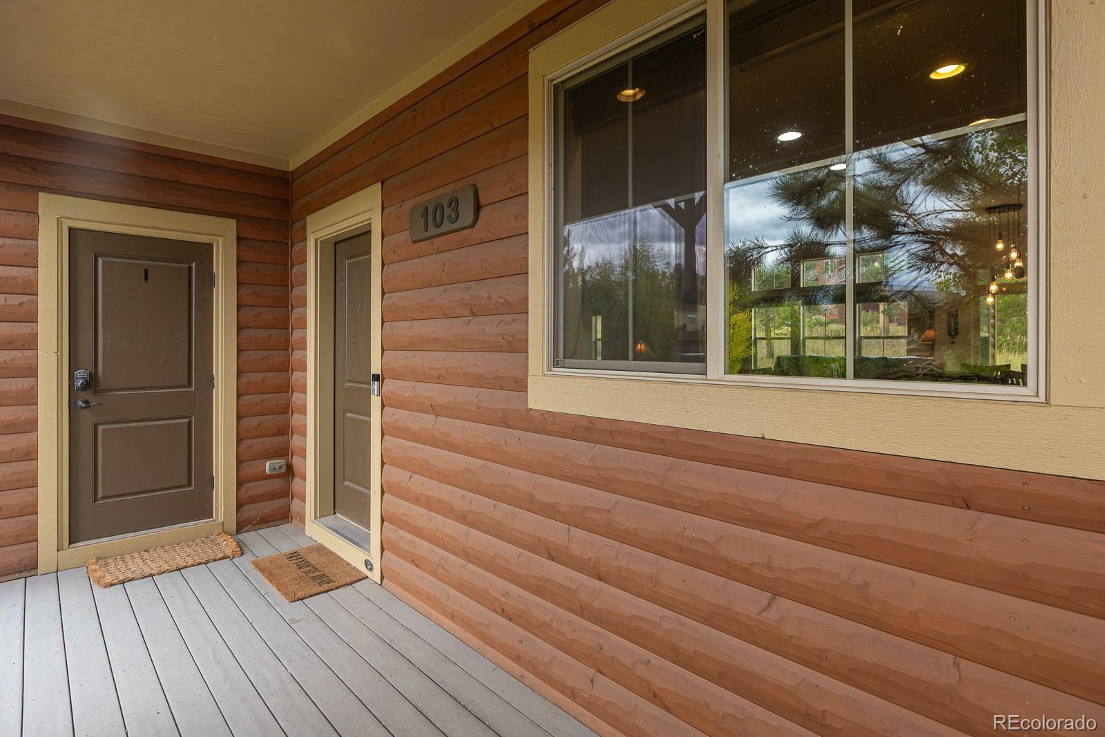 103 Timber Court Granby, CO 80446 - Photo 41 of 50 wooden floor and window in an empty room