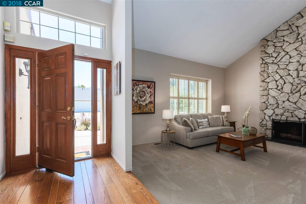 9458 Thunderbird Place San Ramon, CA 94583 - Photo 1 of 1 a living room with furniture and a fireplace