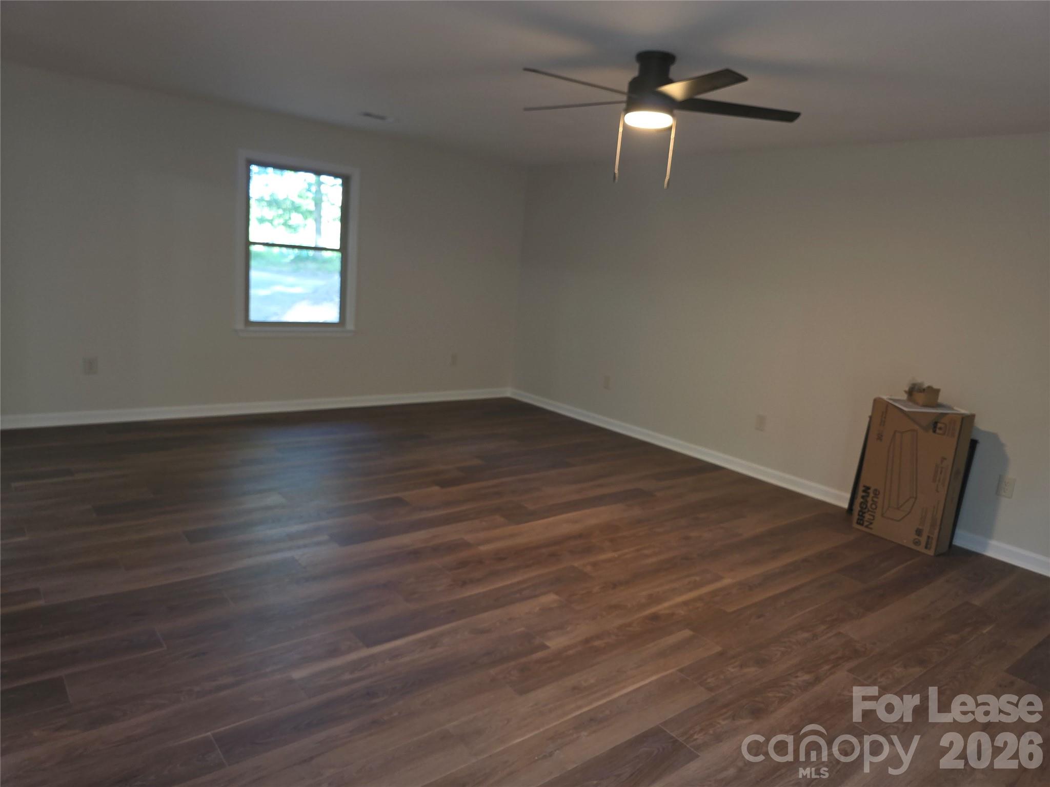 5710 Unionville Road Monroe, NC 28110 - Photo 5 of 18 a view of empty room with wooden floor