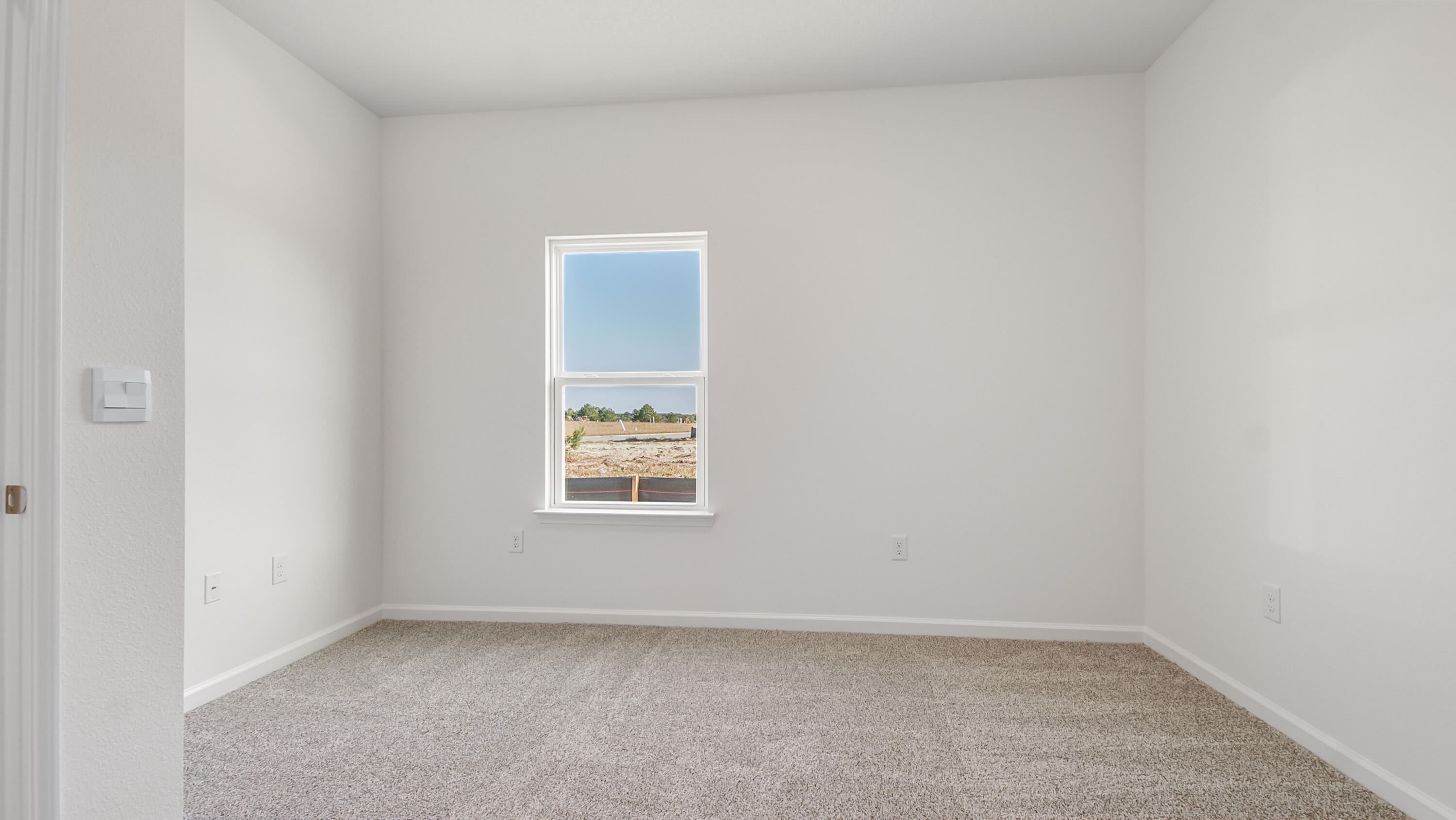 214 Sweetthorn Street Freeport, FL 32439 - Photo 16 of 36 an empty room with a window