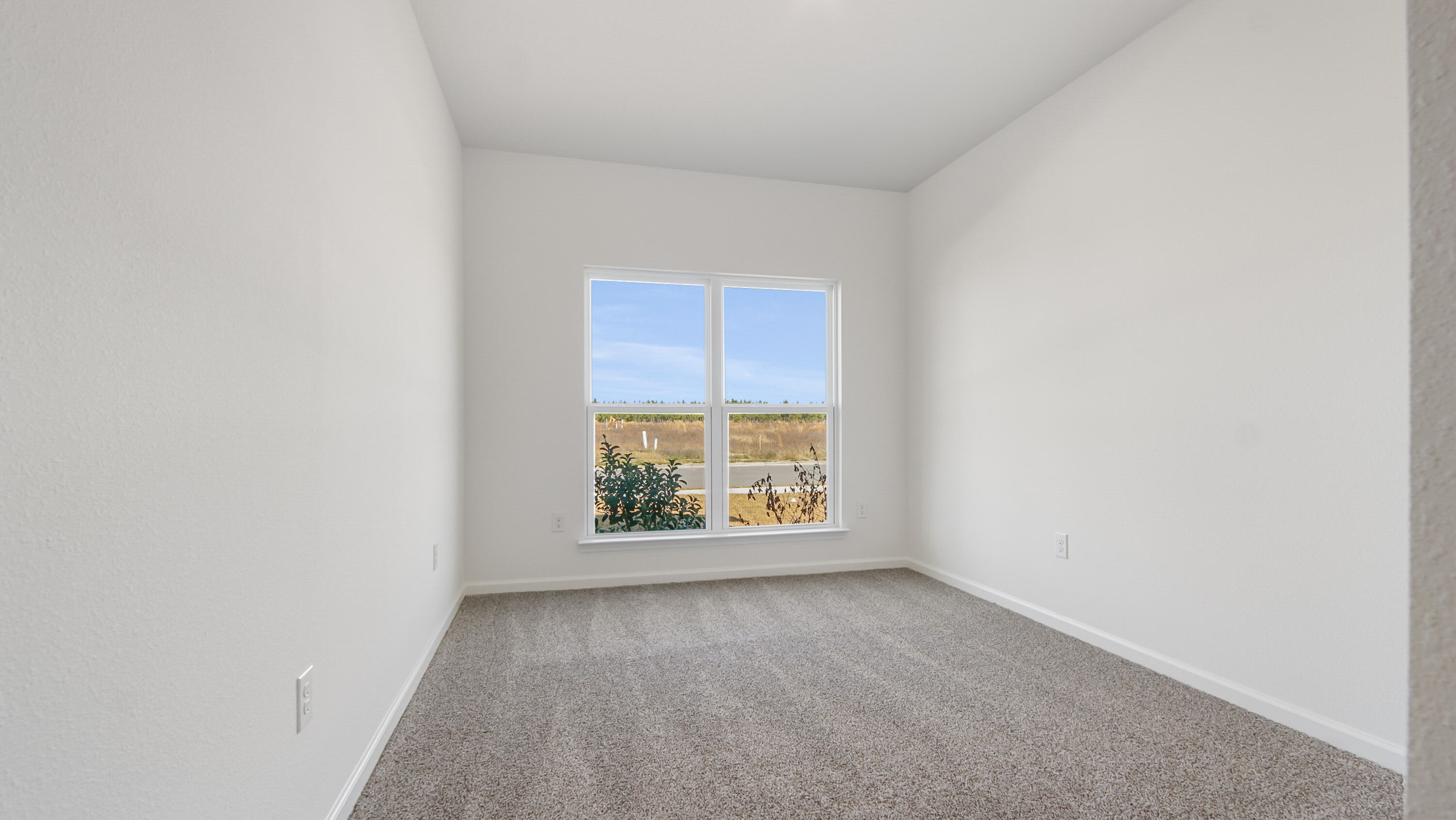 214 Sweetthorn Street Freeport, FL 32439 - Photo 18 of 36 an empty room with windows