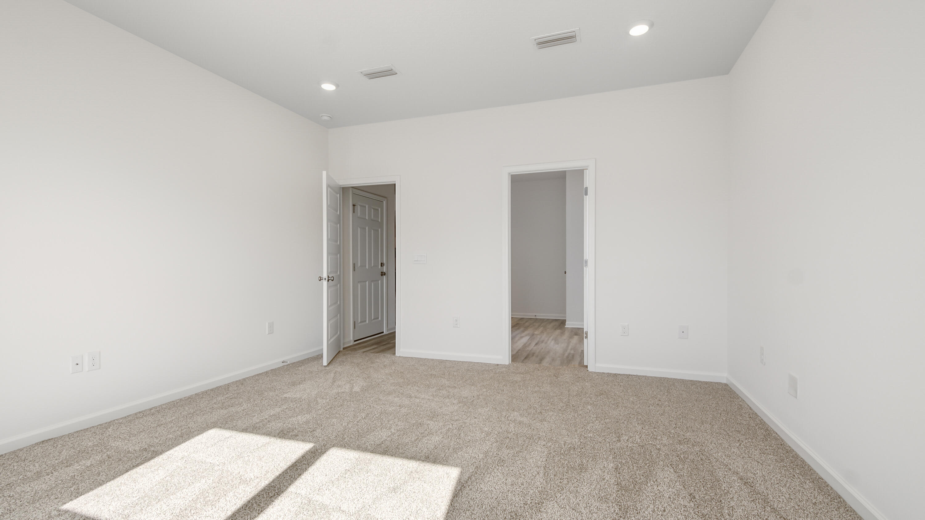 214 Sweetthorn Street Freeport, FL 32439 - Photo 23 of 36 an empty room with an entryway