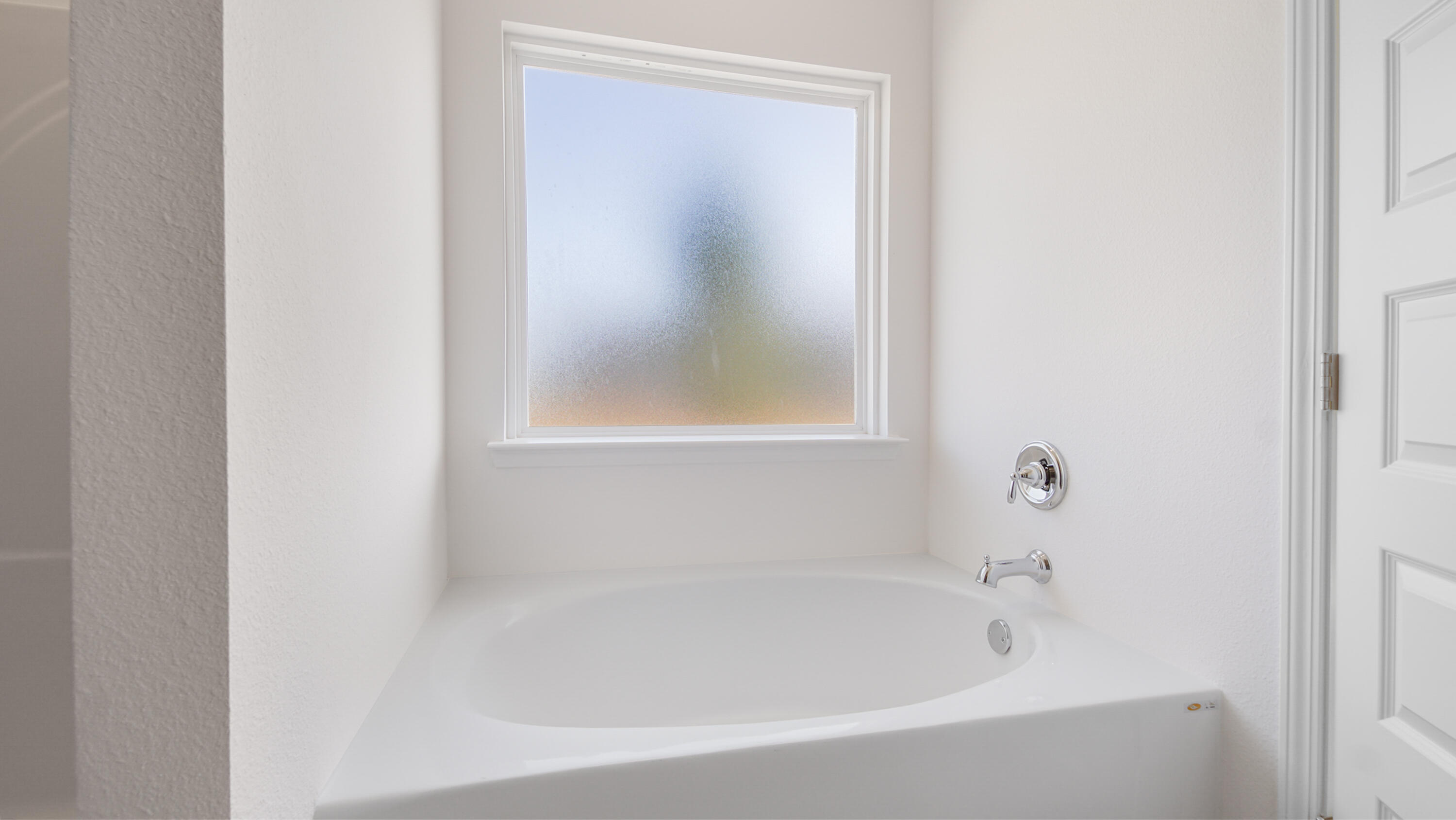 214 Sweetthorn Street Freeport, FL 32439 - Photo 28 of 36 a white bath tub sitting next to a small window