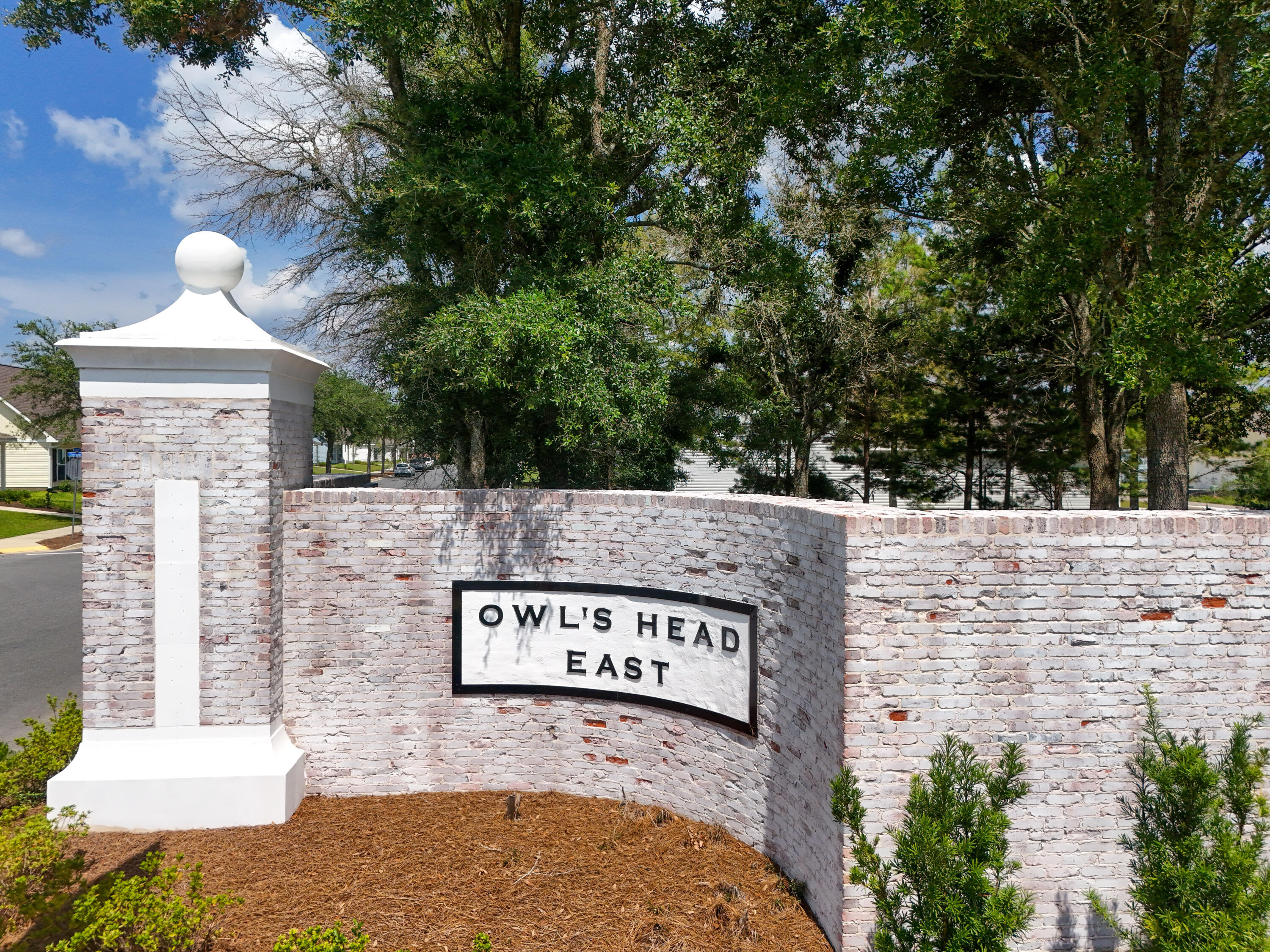 214 Sweetthorn Street Freeport, FL 32439 - Photo 33 of 36 a view of a street with a building in the background