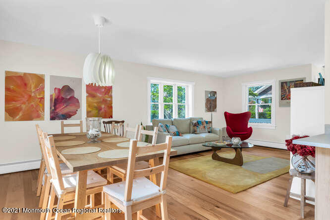 209 Howe Street Point Pleasant, NJ 08742 - Photo 8 of 27 a living room with furniture a rug and a large window