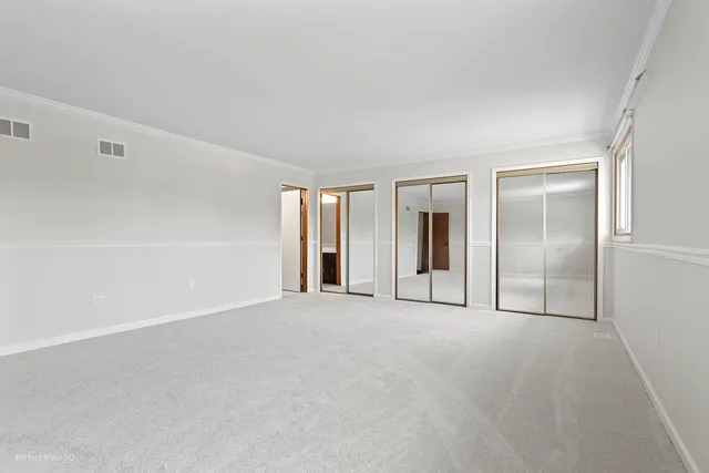 a view of an empty room with window