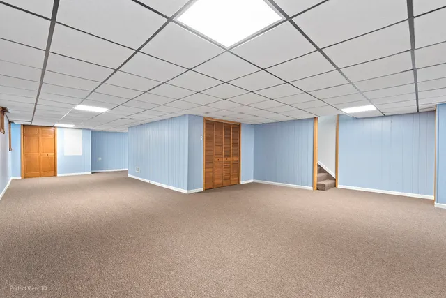 a view of empty room with painted walls