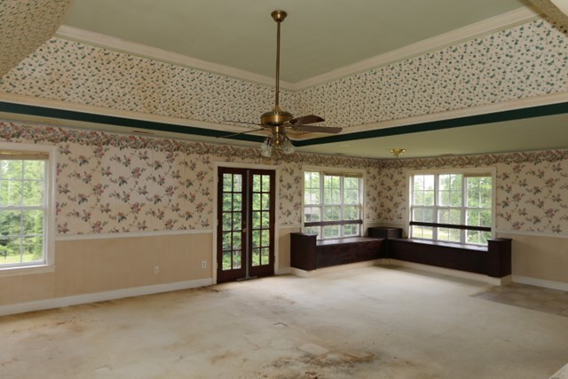 157 Gates Road Lizella, GA 31052 - Photo 18 of 30 a view of a livingroom with a ceiling fan and window
