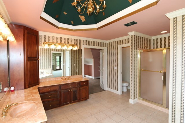157 Gates Road Lizella, GA 31052 - Photo 20 of 30 a bathroom with a double vanity sink and mirror