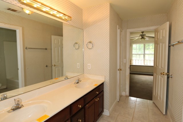 157 Gates Road Lizella, GA 31052 - Photo 26 of 30 a bathroom with a sink and a mirror