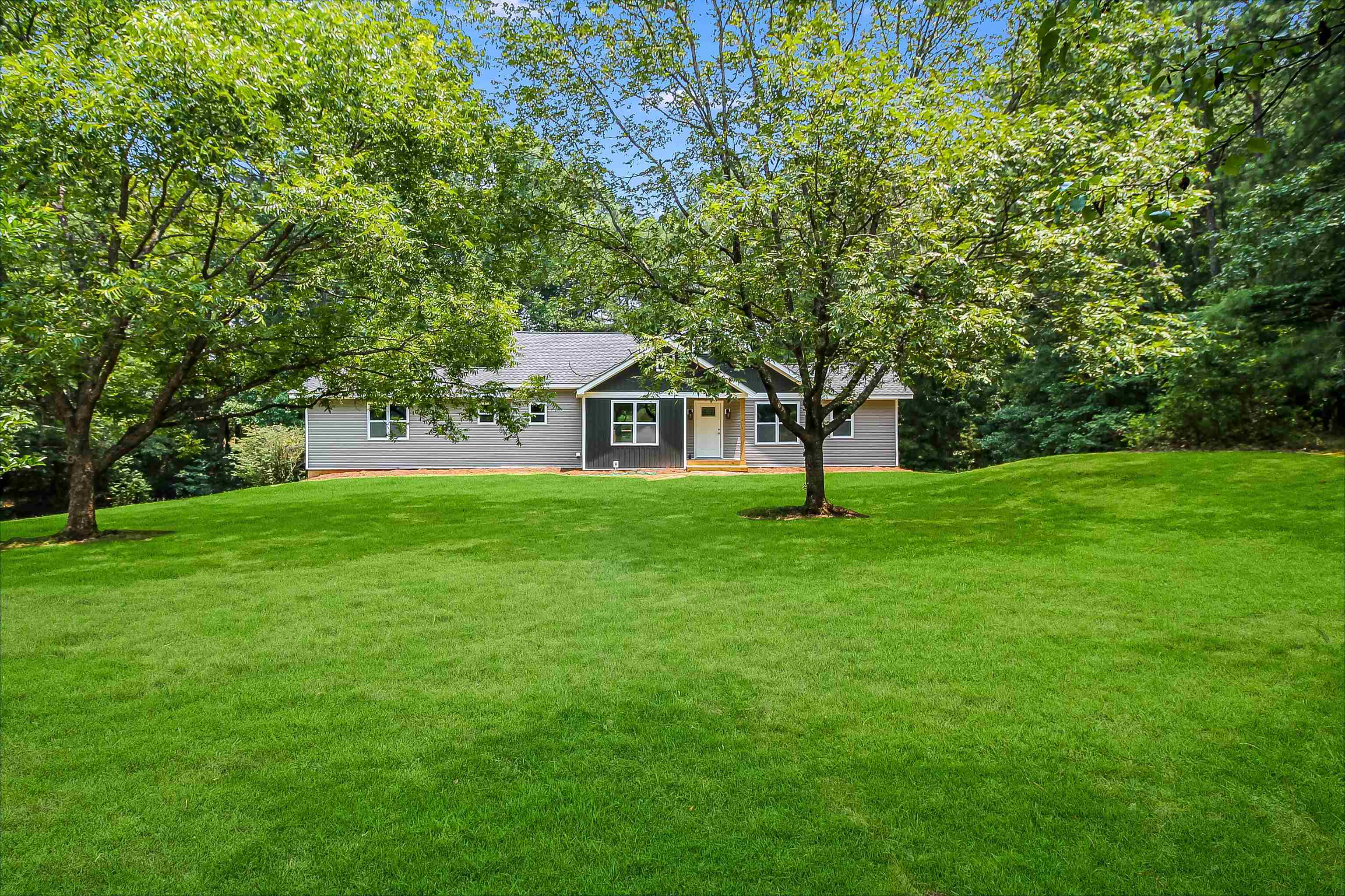 1150 South Bethany Road Locust Grove, GA 30248 - Photo 1 of 1 a house view with a garden space