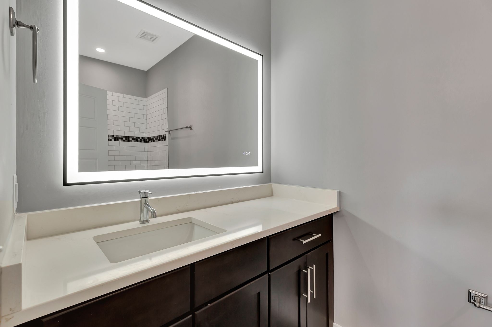 2003 Convent Place, Unit 9 Nashville, TN 37212 - Photo 23 of 31 a bathroom with a sink and a mirror